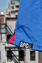 Load image into Gallery viewer, Scenes NY x SFC Blue Shorts with Red Jersey Mesh detailing on side seams
